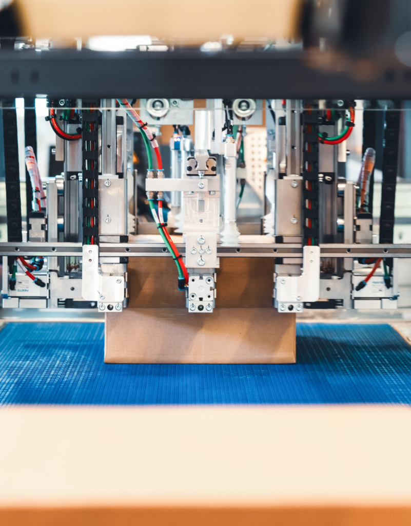 detail shot of the sensors of the right-size packaging machine measuring a package coming through